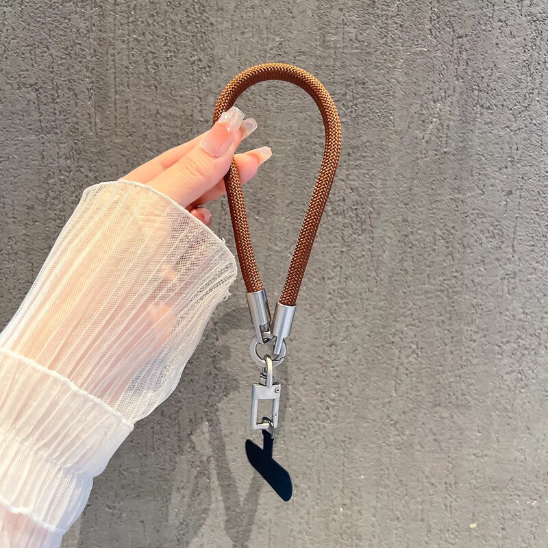 メーカーは、屋外で便利な紛失防止、強力で耐久性のあるポータブルな8mm手首タイプの高密度織り携帯電話ストラップを製造しています。|undefined