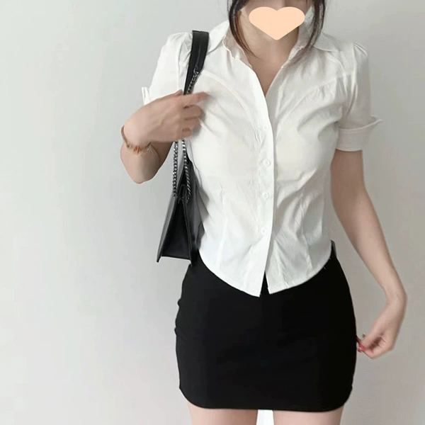 Black colored shirt, hip-accented