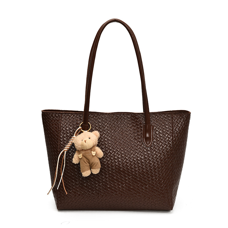 Bolsa de moda retro de gran capacidad para mujeres 2025 nueva bolsa de hombro transfronteriza simple textura casual bolso de abrigo