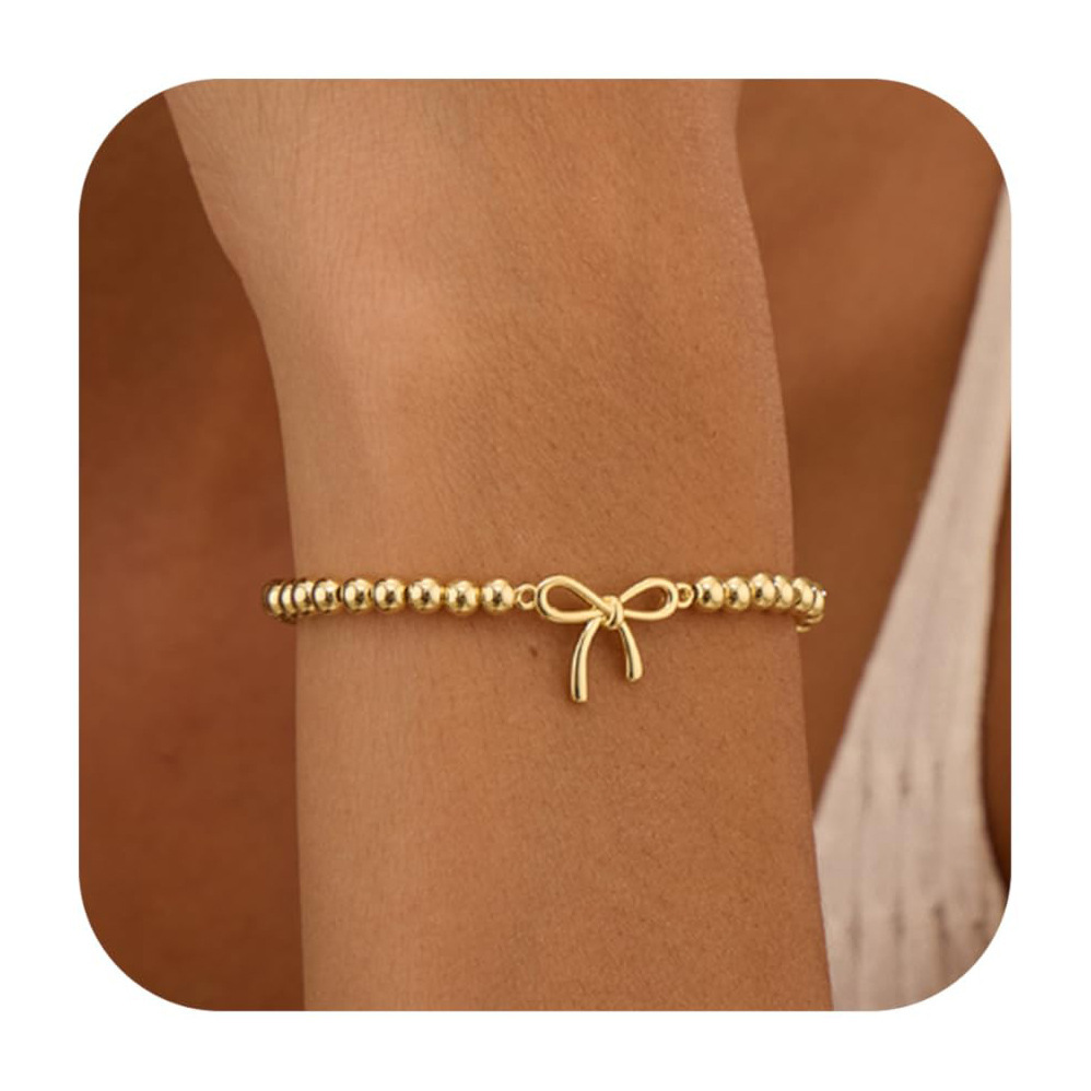 Bracciale con perline dorate nodo a cuore e anelli geometrici_voghion.com
