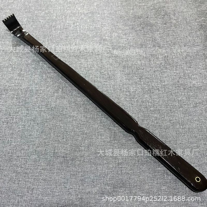 烏木紫光檀の実木がむずむずしています。家庭用の実木が背中をつかんでいます。|undefined