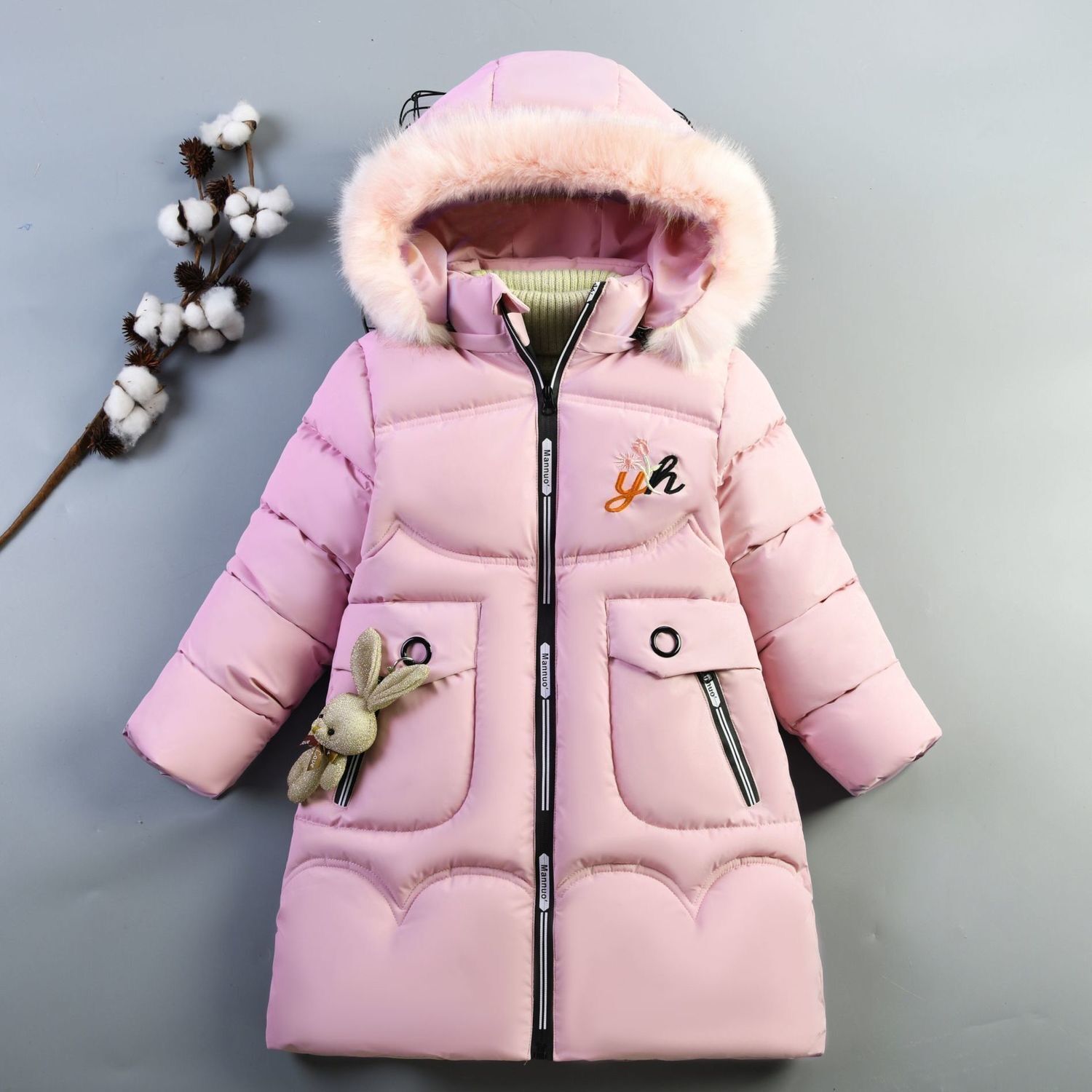 Invierno Nueva ropa de algodón acolchado para niñas de estilo coreano conejo de dibujos animados para niños de longitud media engrosada abajo ropa acolchada de algodón de moda