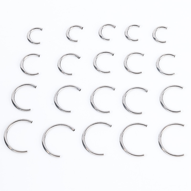 Silver pointed spike labret stud material detail