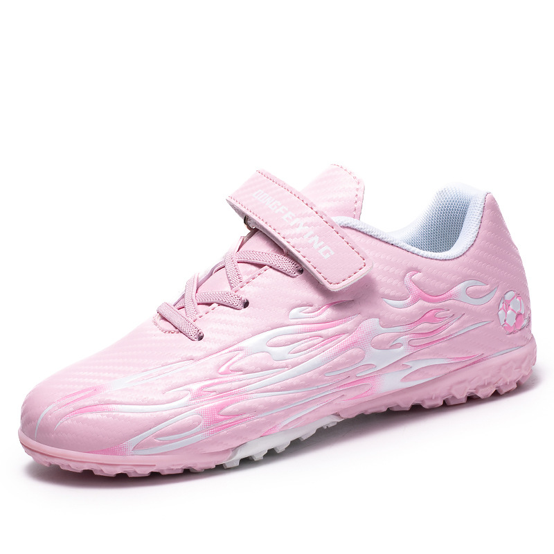 2025 nuevos niños y niñas transfronterizos zapatos de entrenamiento de clavos zapatos de fútbol estudiantes zapatos de fútbol de desgaste fábrica directa