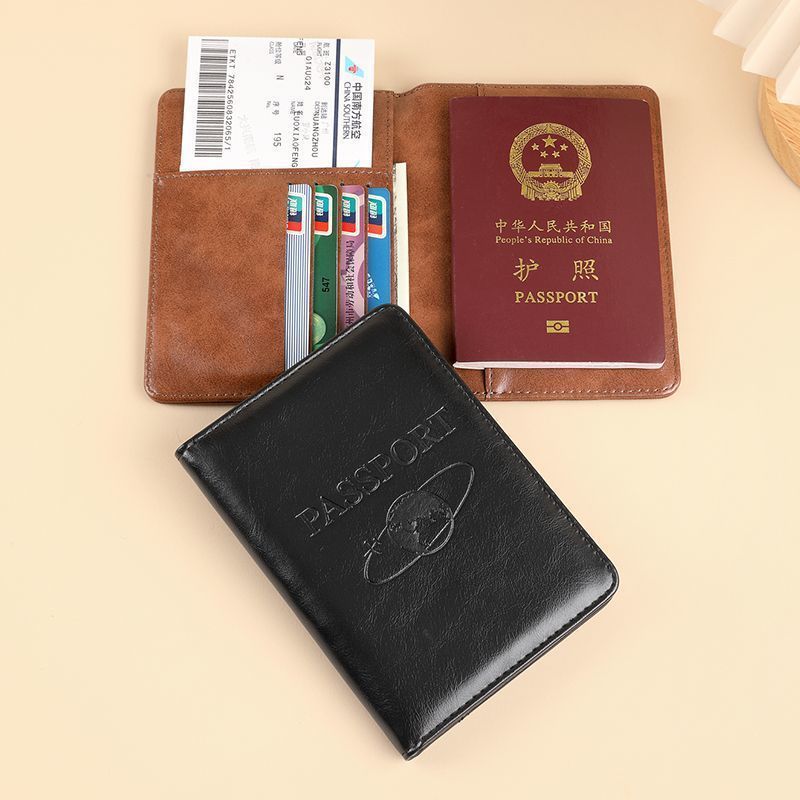 La nueva cubierta protectora de pasaporte retro de gama alta RFID antirrobo pasaporte pasaporte bolsa de identificación masculina billetera tarjeta antimagnética