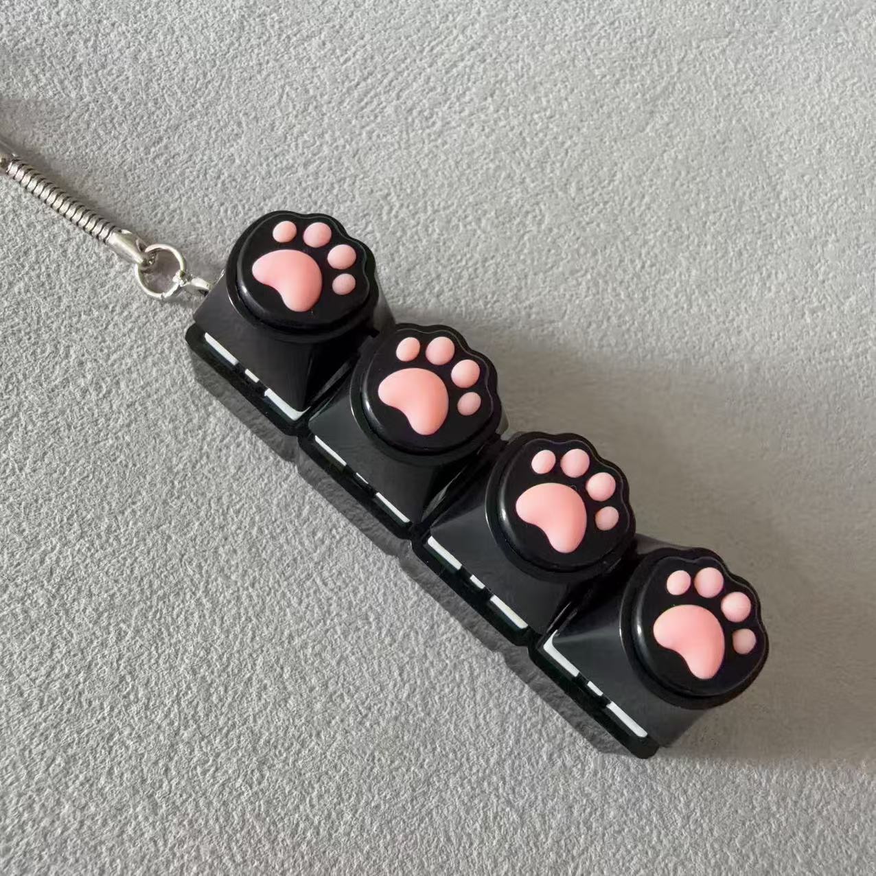 Four-button black shell - silicone black cat paw