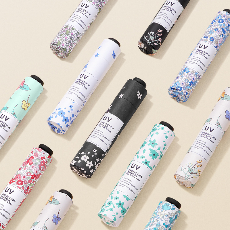 三つ折り超軽量傘日焼け止め紫外線防止傘黒ゴム傘携帯折り畳み晴れ傘両用日傘女