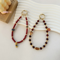 國風仿硃砂紅瑪瑙手機鏈隨身掛繩小眾原創設計轉經筒財神元寶掛飾