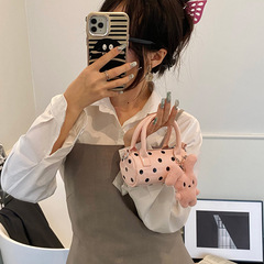 2025新型韓国版ミニ子供親子モデルの波点枕を持って斜めに掛けて飾ります。