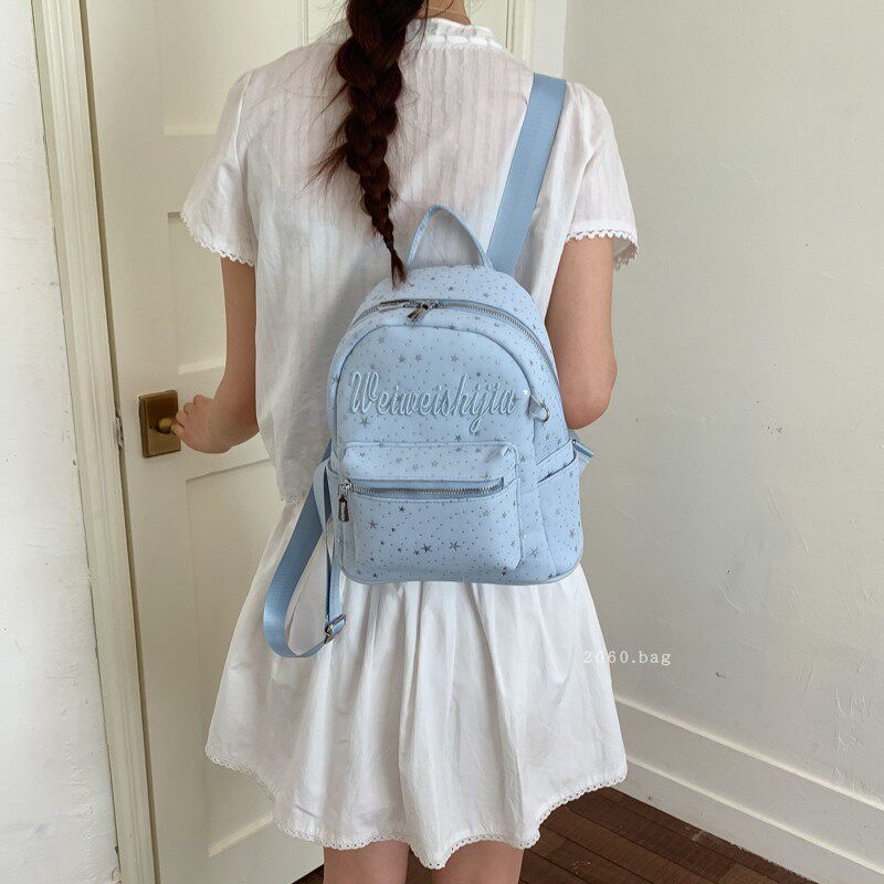 Mochila de moda mochila 2026 mochila de gran capacidad para estudiantes universitarios en clase nueva primavera bolsa de letras lienzo para mujeres