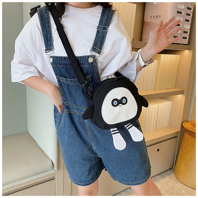 The new 2024 children's egg-shaped party backpack is a cute cartoon canvas single-shoulder bag and a fashionable and stylish small backpack undefined
