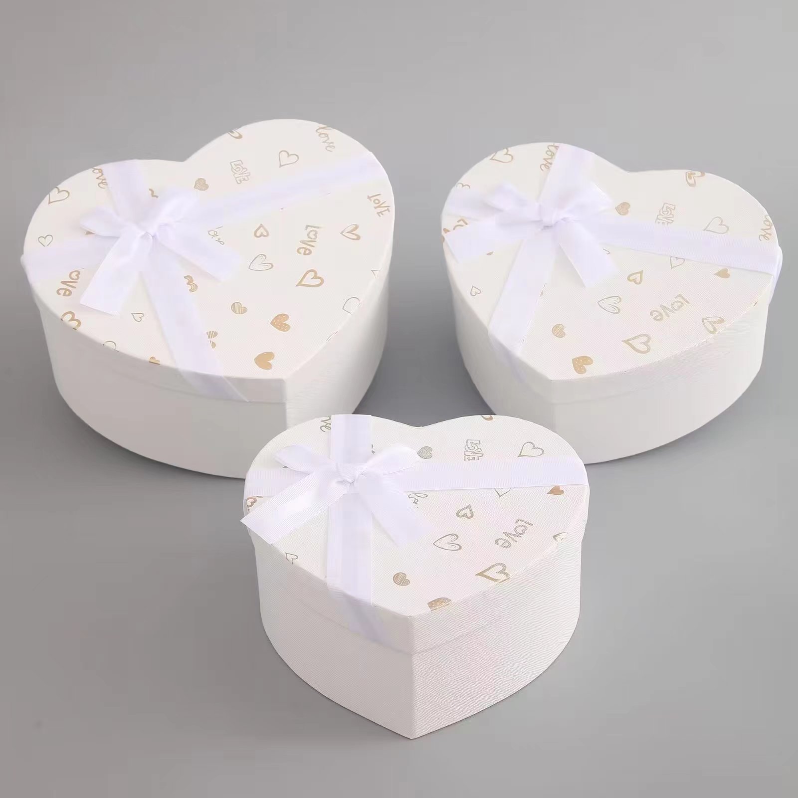 Nuevo estilo bowknot love caja de regalo de embalaje caja de flores en forma de corazón cubierta del cielo caja de regalo de cumpleaños de Tanabata de Navidad