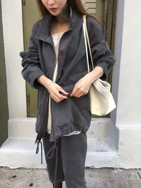 In-stock Korean Dongdaemun 2026 Autumn New Solid Color Patchwork Pocket Long Sleeve Drawstring Jacket Casual Coat
