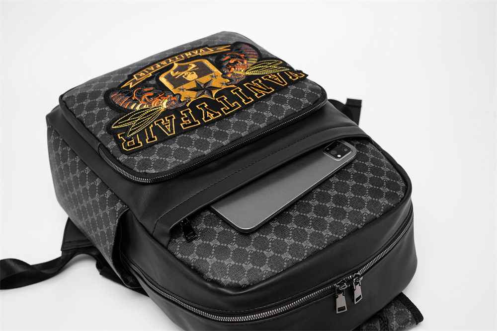 Sac à dos pour ordinateur portable pour homme avec broderie originale - Sac de travail antivol de grande capacité et résistant à l'eau, sac d'ordinateur durable de 15 pouces, style de voyage unisexe 2025_voghion.com