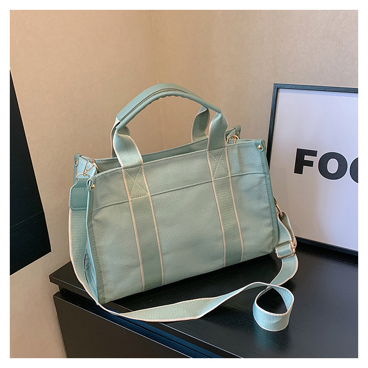 Bolso de lona de gran capacidad para mujer 2024 nuevo estilo coreano simple bolso de mensajero de un solo hombro bolso de viaje casual
