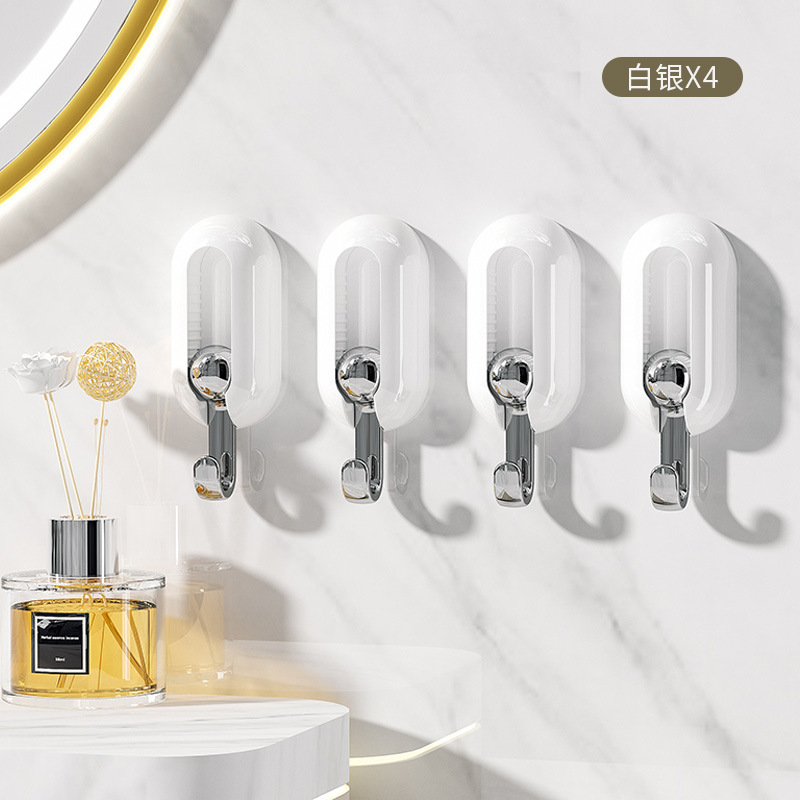 En stock gancho giratorio creativo 2023 gancho pegajoso fuerte detrás de la puerta de soporte de carga sin costuras adhesivo pasillo percha al por mayor