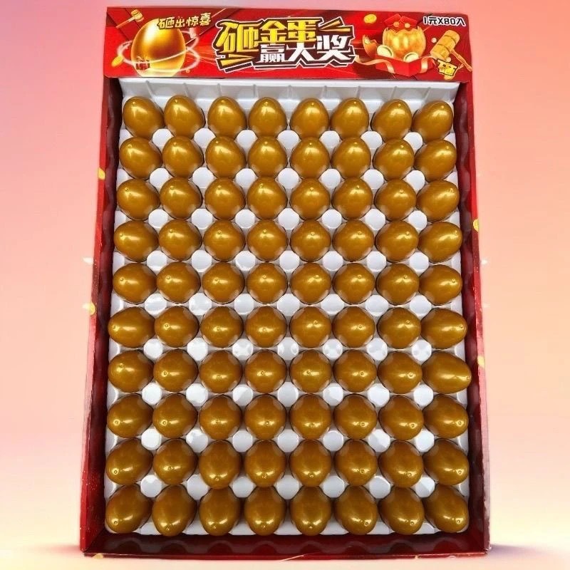 Huevos de oro 100 en la descompresión de los niños, juguetes de aplastamiento sorpresa, huevos de oro, tiendas de estudiantes de huevos de Pascua, juguetes de venta caliente