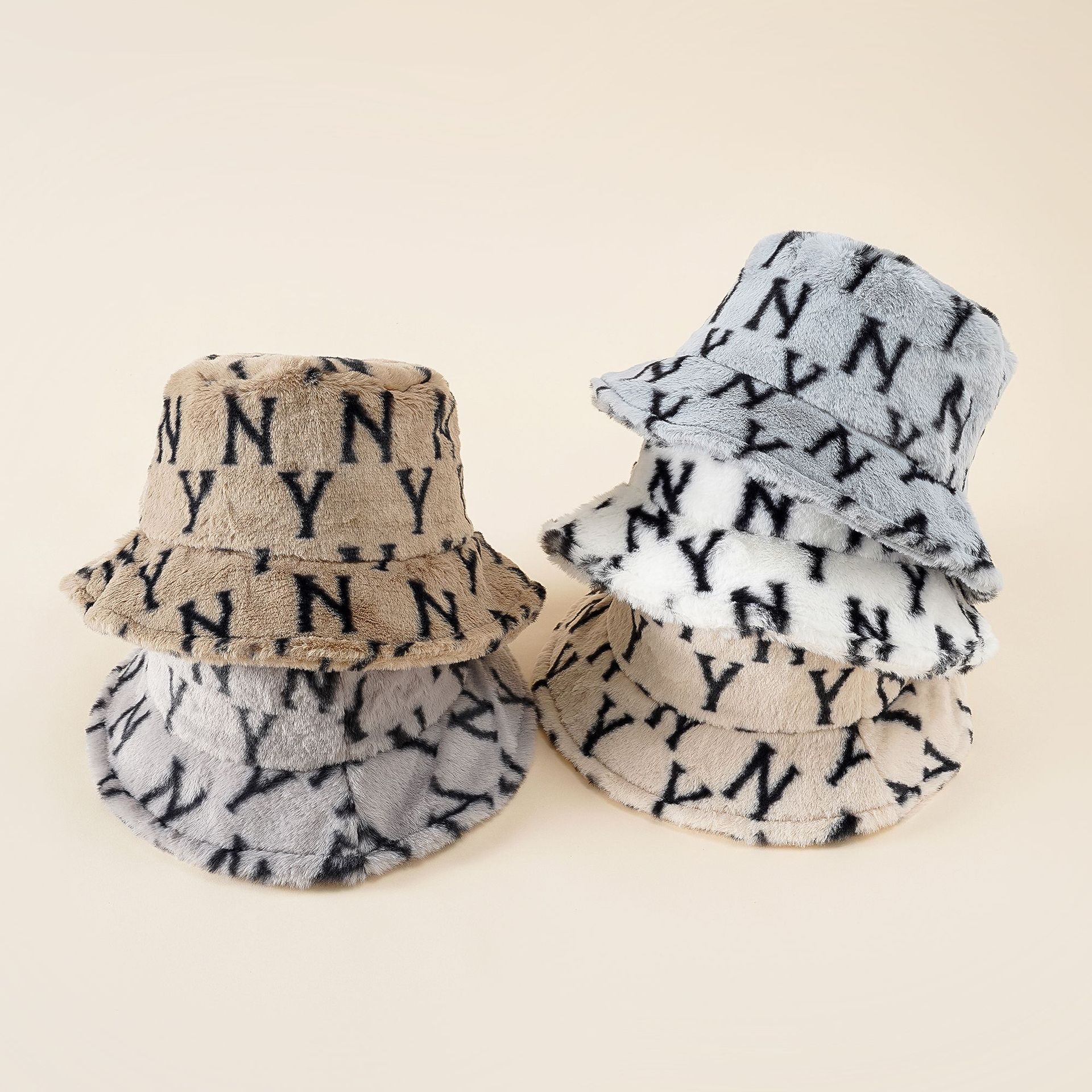 Sombrero femenino invierno cálido moda letras color sólido grueso felpa cuenca sombrero Cordero lana estilo coreano japonés protección del oído sombrero del pescador