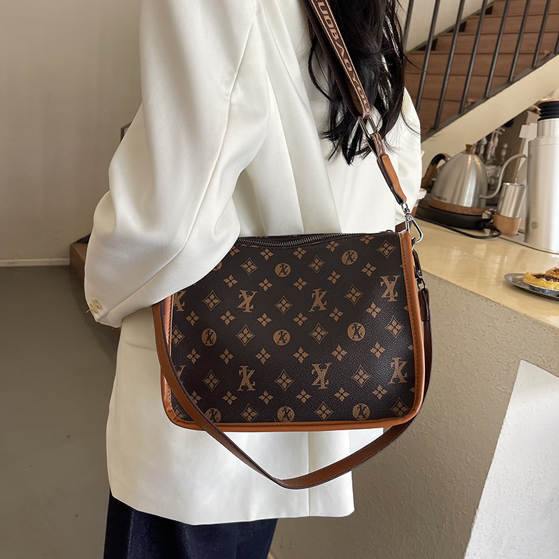 Hong Kong estilo retro bolso de verano 2025 nueva textura transfronteriza bolso de hombro de mujer correa de hombro ancha color contraste de moda mochila