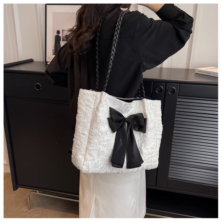 Large-capacity bow bag for women, 2023 new trendy, fashionable and sweet single-shoulder bag, student commuting tote bag undefined
