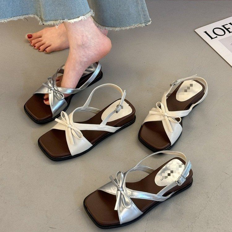 Hermosas sandalias para mujeres 2026 verano nuevo arco pendiente talón grueso no se cansará de los pies traseros sandálias de playa
