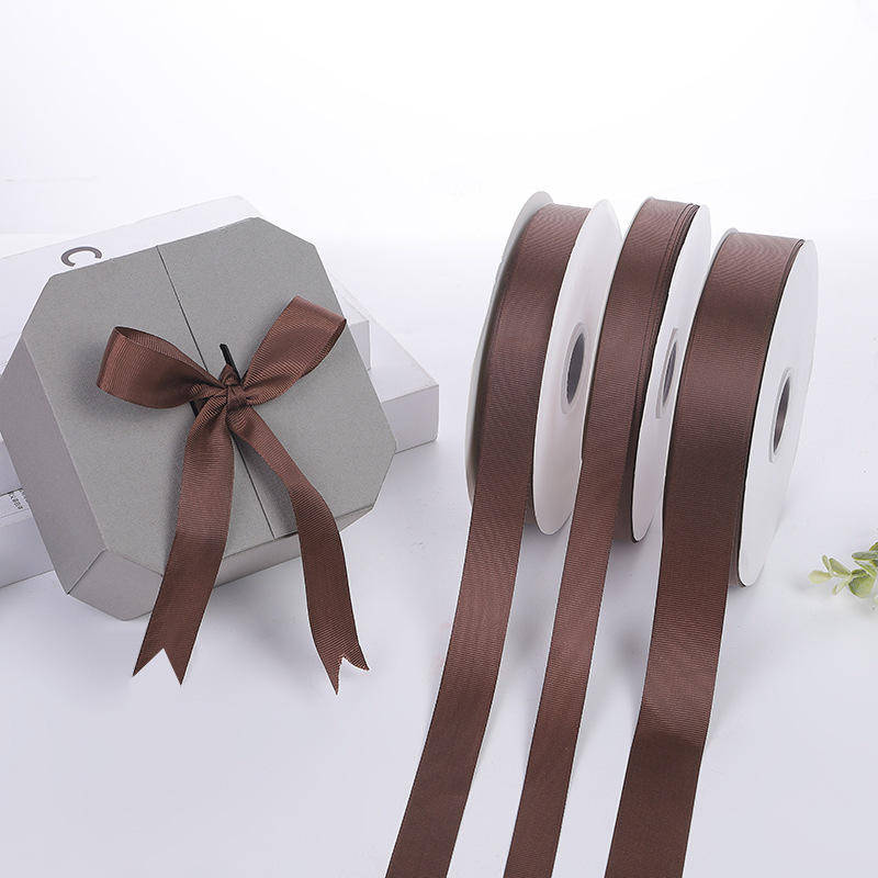 Suministro directo de fábrica cinta roscada cinta marrón caja de regalo embalaje bolso cinta accesorios de ropa cinta al por mayor