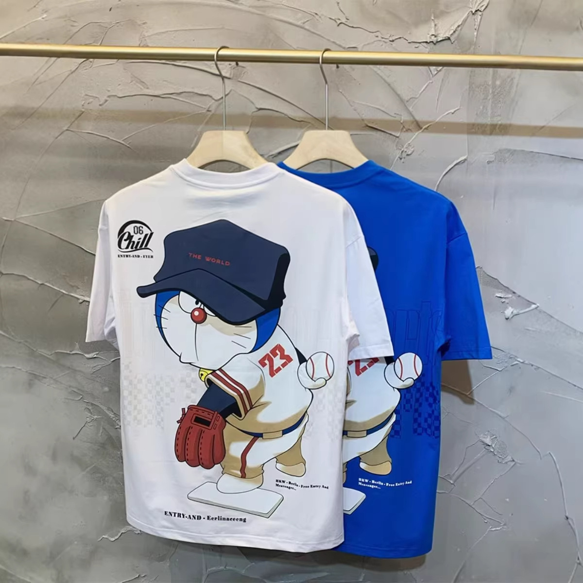 Marca de moda impresión de dibujos animados camiseta de manga corta para hombres verano camiseta de cuello redondo de media manga adolescente ropa casual suelta