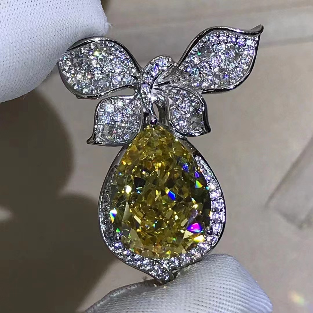 Cortado en forma de gota de agua colgante amarillo rosa de doble propósito 925 plata incrustado importación 10 quilates taladro de alto carbono