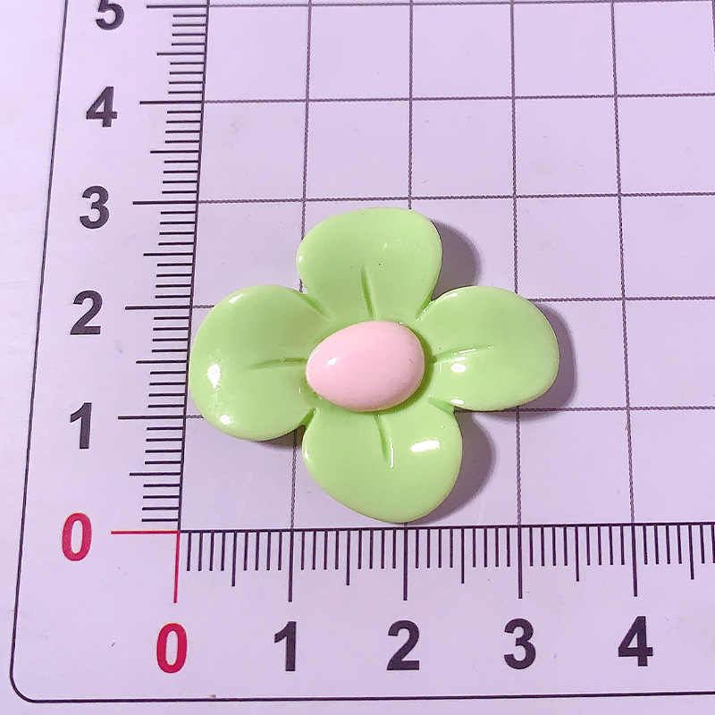 Accesorios de resina de cuatro pétalos de macarrón transfronterizo DiDi accesorios para el cabello de la caja del teléfono móvil agujero de los zapatos colgantes pequeños materiales hechos a mano