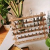 The decorative mouth solid wood storage rack can fold the storage line baking tool to organize the wooden shelf squeezing the flower mouth shelf