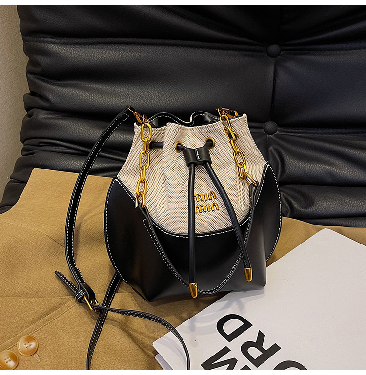 Bolsa de cubo de mano de cadena de alta calidad de mujer nueva moda transfronteriza lienzo de moda empalmado mochila de hombro