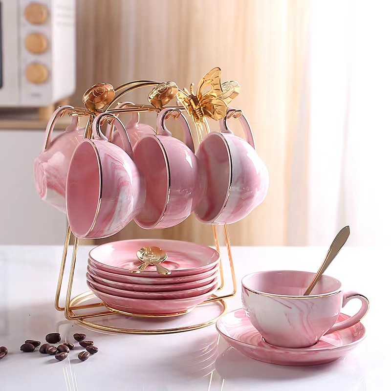 Luz de lujo taza de café traje de estilo europeo de alta apariencia taza y platillo taza de café de cerámica de alta gama exquisito juego de té de la tarde británica