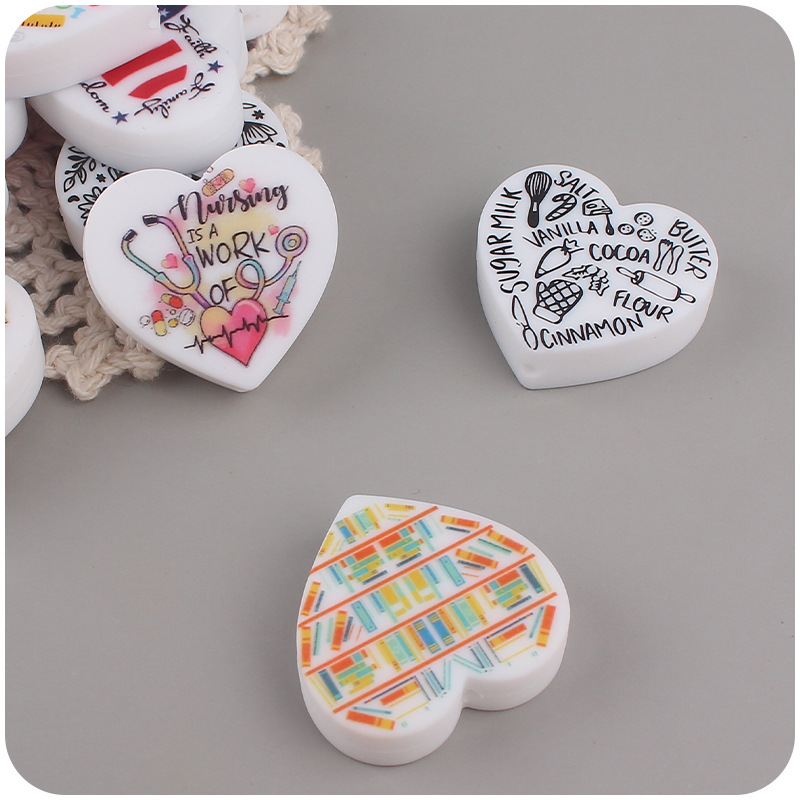 Nuevo bebé suministros de dibujos animados amor impresión pequeña mordedor creativo DIY bebé chupete cadena teether Accesorios