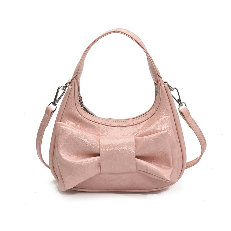 Bolso de moda coreano 2025 verano nuevo bolso femenino de alta calidad textura bolso de hombro lindo lazo bolso de mensajero