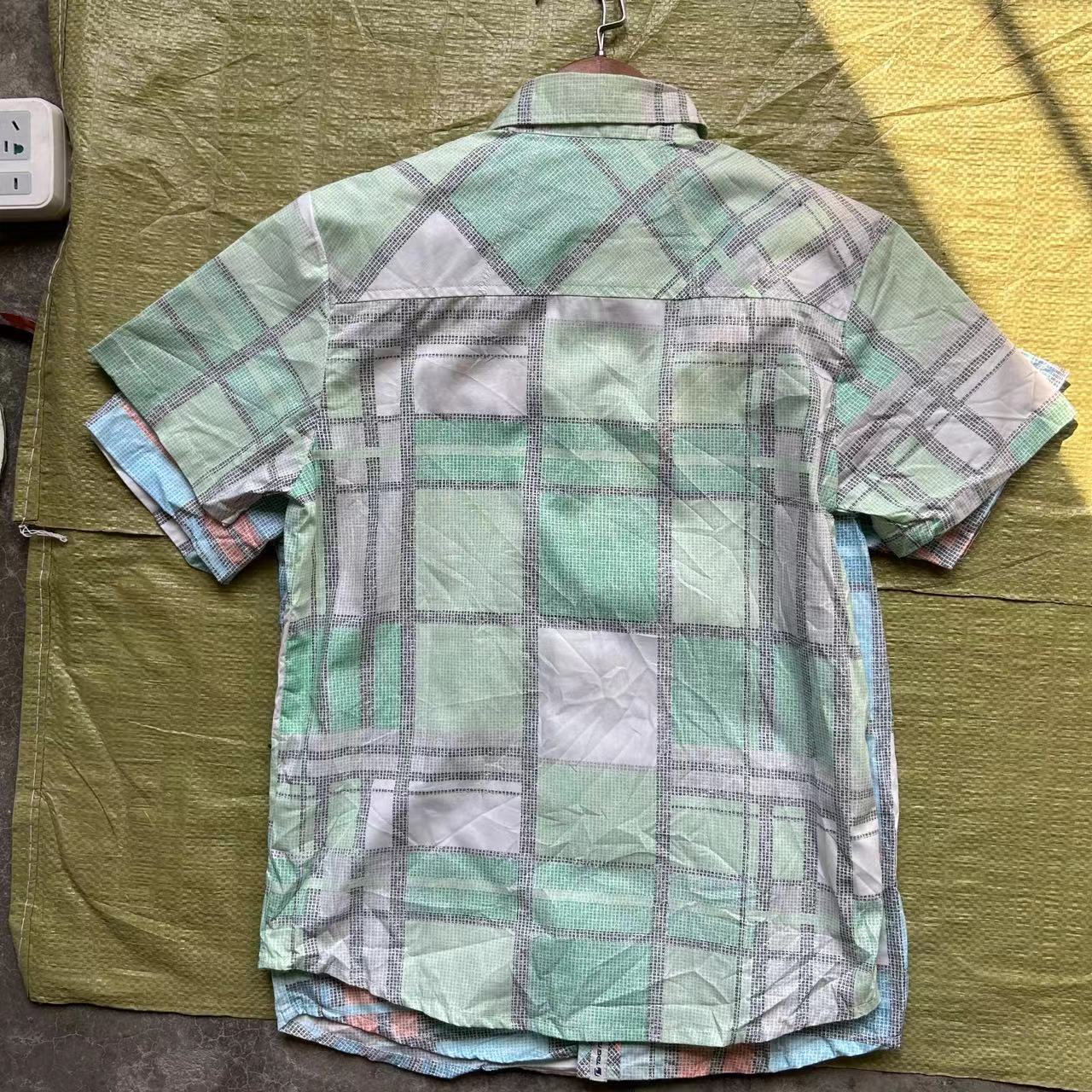 Ropa para niños hoja de cola de comercio exterior camisa de manga corta de algodón para niños medianos y grandes 24 nuevos hombres y mujeres forro de verano misceláneo