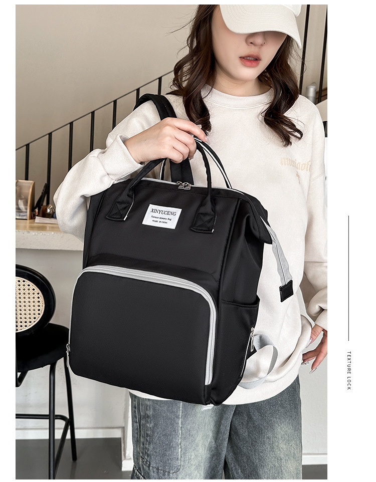 Solid-color lightweight mom bag, a backpack for taking kids out, multi-functional large-capacity mother and baby bag for girls undefined