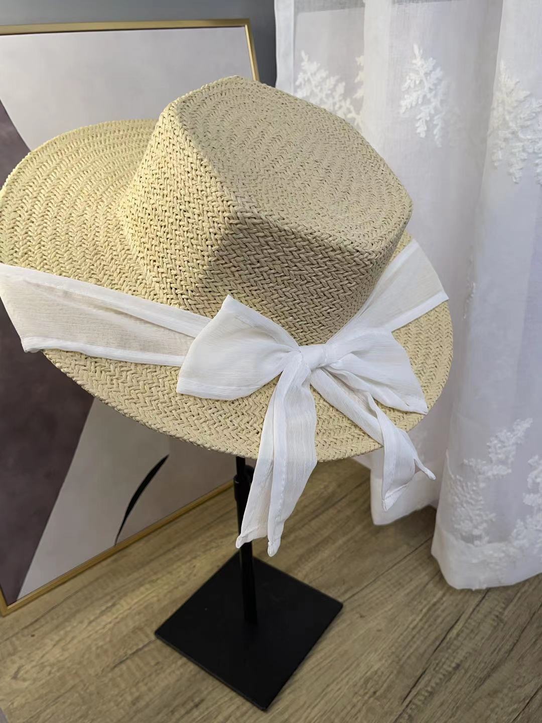A female hat with a spring and summer ribbon, butterfly sash, hexagonal straw hat, Korean street style, anti-ultraviolet sun hat, and a wide-brimmed hat detail image 9