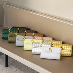 2023 New Niche Woven Bag: Premium Small Square Bag with Gold Lock, in Cowhide Leather—Chanel-Style Quilted Design, Perfect for Shoulder or Crossbody Wear