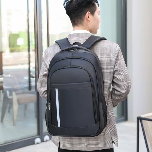 Cross-border large-capacity casual backpack men's fashion simple junior high school student schoolbag Net LOGO business backpack