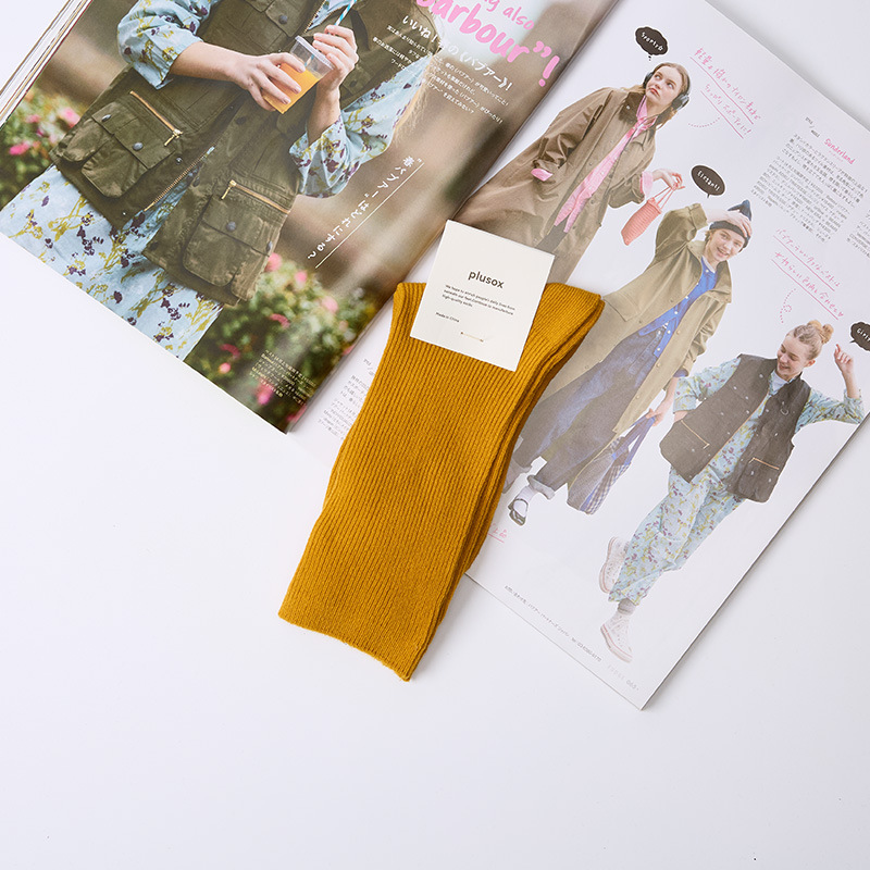 Venta al por mayor calcetines de pila de mujer nueva japonesa otoño color sólido calcetines de algodón de longitud media calcetines de color caramelo de aguja doble de mujer