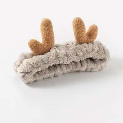 Otoño y invierno dibujos animados peluche lavar la cara cinturón de cabello máscara de mujer lavar la cara cinturón de cabello impermeable estereoscópico impermeable adornamientos de cabello al por mayor