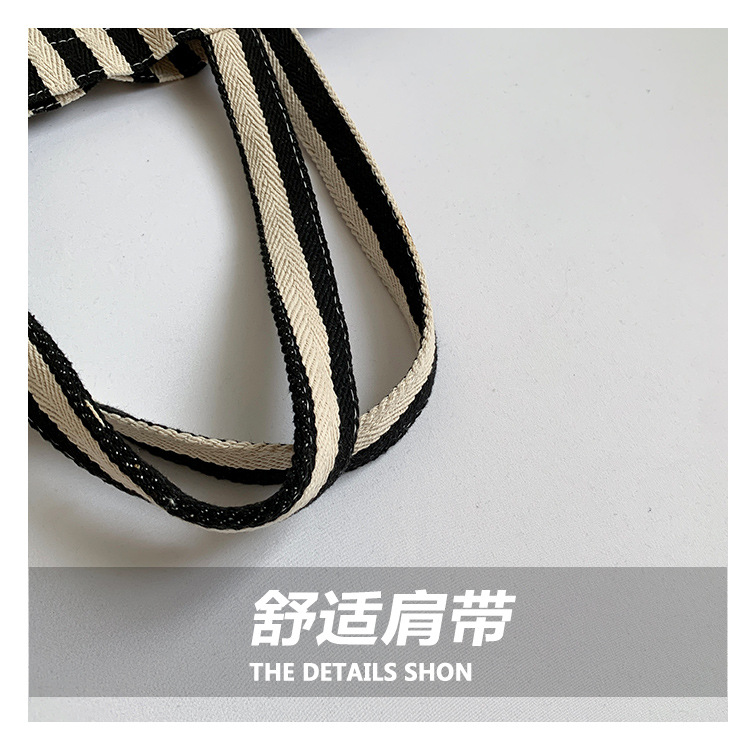 2024 Autumn/Winter new versatile and fashionable striped handbag shopping bag, two-tone large-capacity trendy single-shoulder bag Item Picture