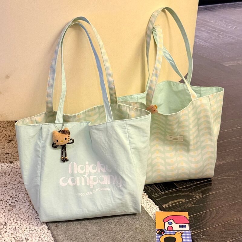 Korean-Style Solid Color Casual Plaid Canvas Bag for Women, Large Capacity Lettered Shoulder Tote Bag, Double-Sided Commuter Cloth Bag Korean-Style Solid Color Casual Plaid Canvas Bag for Women, Large Capacity Lettered Shoulder Tote Bag, Double-Sided Commuter Cloth Bag