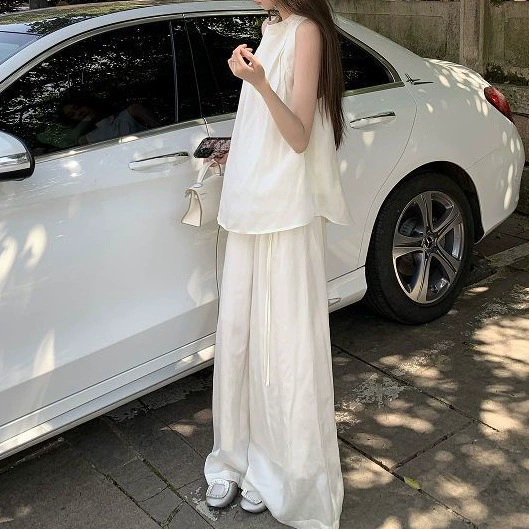 Летний красивый повседневный костюм темперамент набор из двух частей ootd носить с чувством высокого уровня летом 2025 супер огонь новый