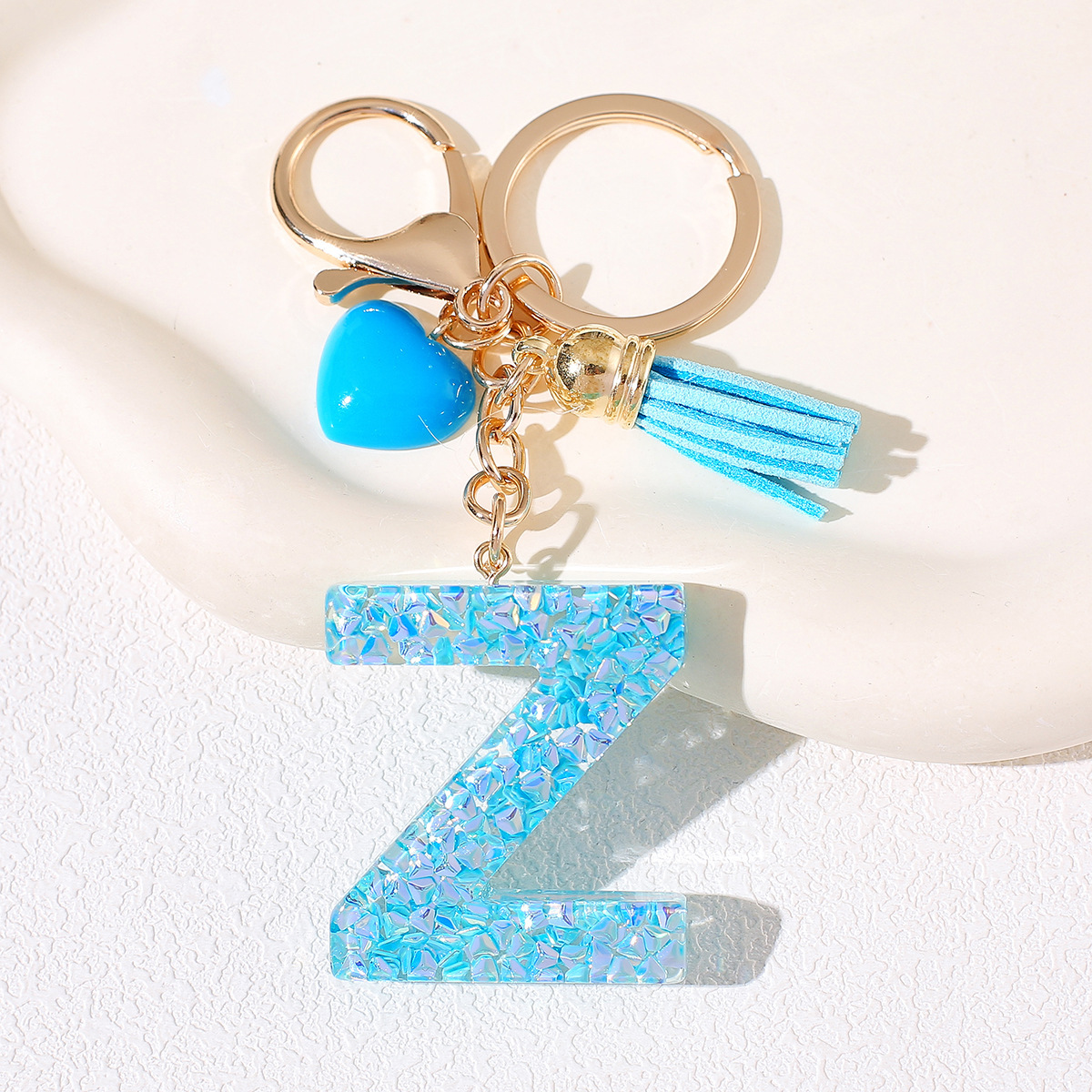 Nuevos productos azules de amor con frascos de letras lindos enclavadores decoraciones europeas y americanas populares llaveros damas