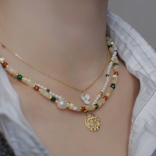 Titanium steel milk tea color freshwater pearl necklace with colored beads, abalone lockchain, layered for a stylish and trendy look.