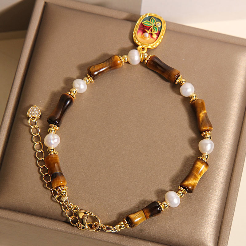 Nueva pulsera china de bambú de piedra de ojo de tigre, colgante de pintura al óleo de perlas de nicho de lujo ligero femenino, pulsera de estilo nacional, joyería de alta calidad