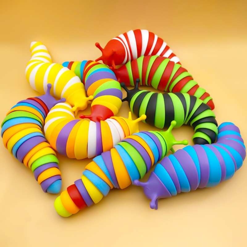 Explosiones transfronterizas simulación descomprimida arco iris sonriente nariz oruga peristáltica puzzles pequeños juguetes para niños animales mayoristas
