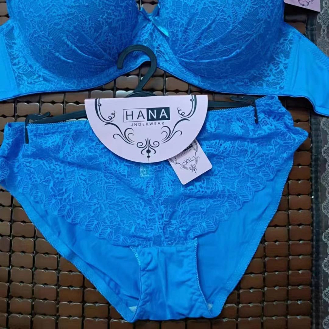 Marca nueva ropa interior de estilo europeo y americano de comercio exterior, encaje de gran tamaño para mujeres con un conjunto de bra de anillo de acero multicolor