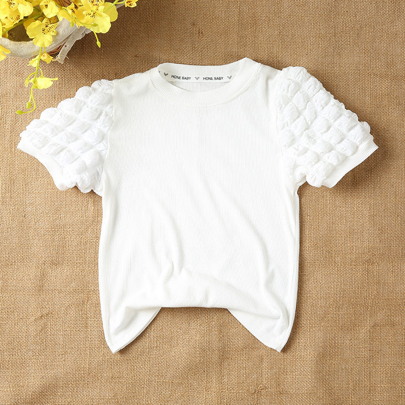 女の子の泡の袖の底のシャツの2025春秋は新型の子供の小さい子供の洋風の長袖のtシャツの韓国版の上着を詰めます。